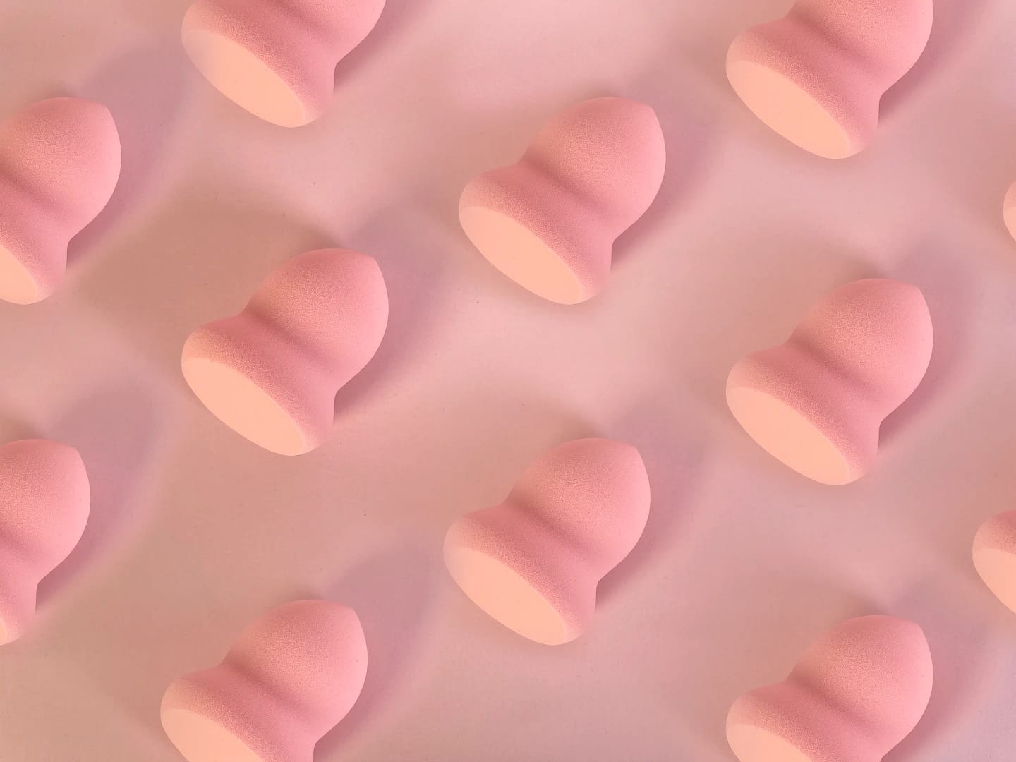 makeup sponges in soft pink tones, showcasing Nocibé products